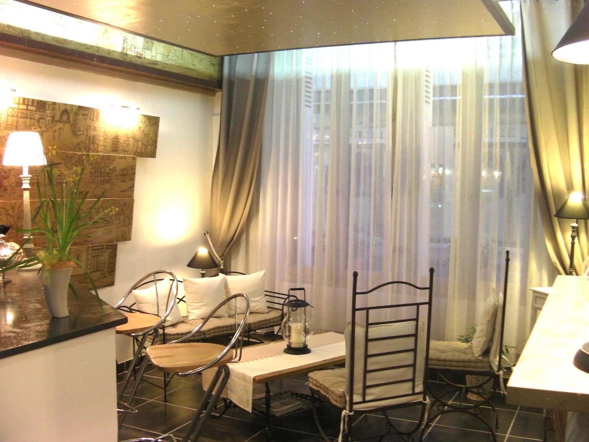 Logis Hotel De France Лош Экстерьер фото